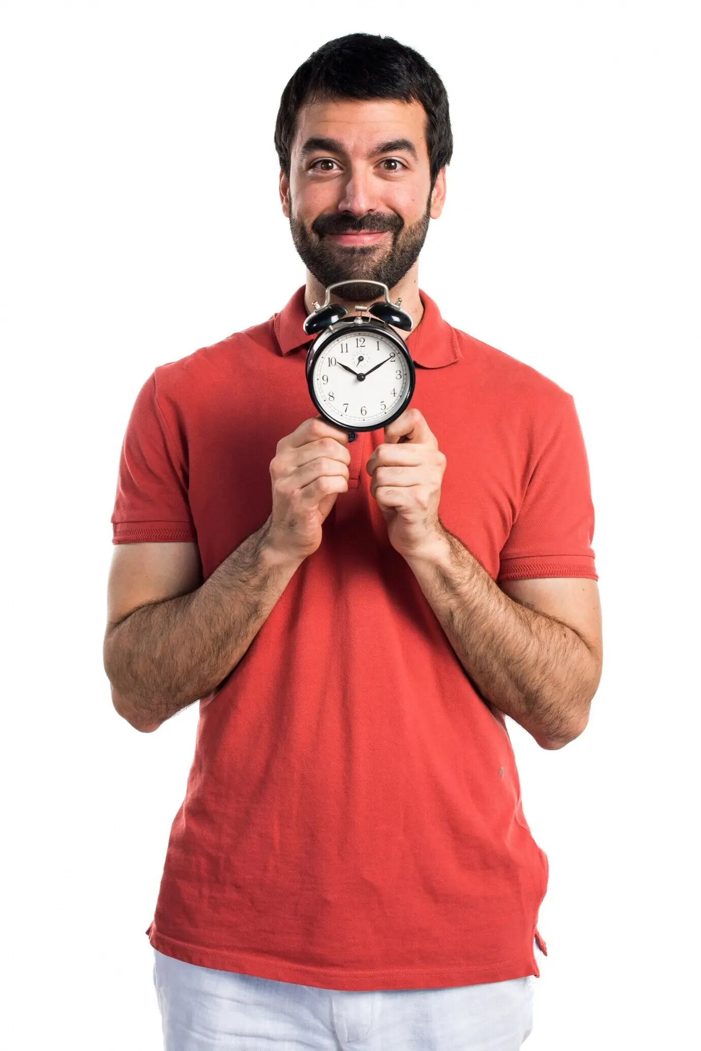 A good-looking man holding a vintage clock.