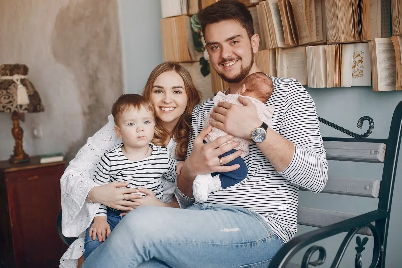 Adorable family sitting at home